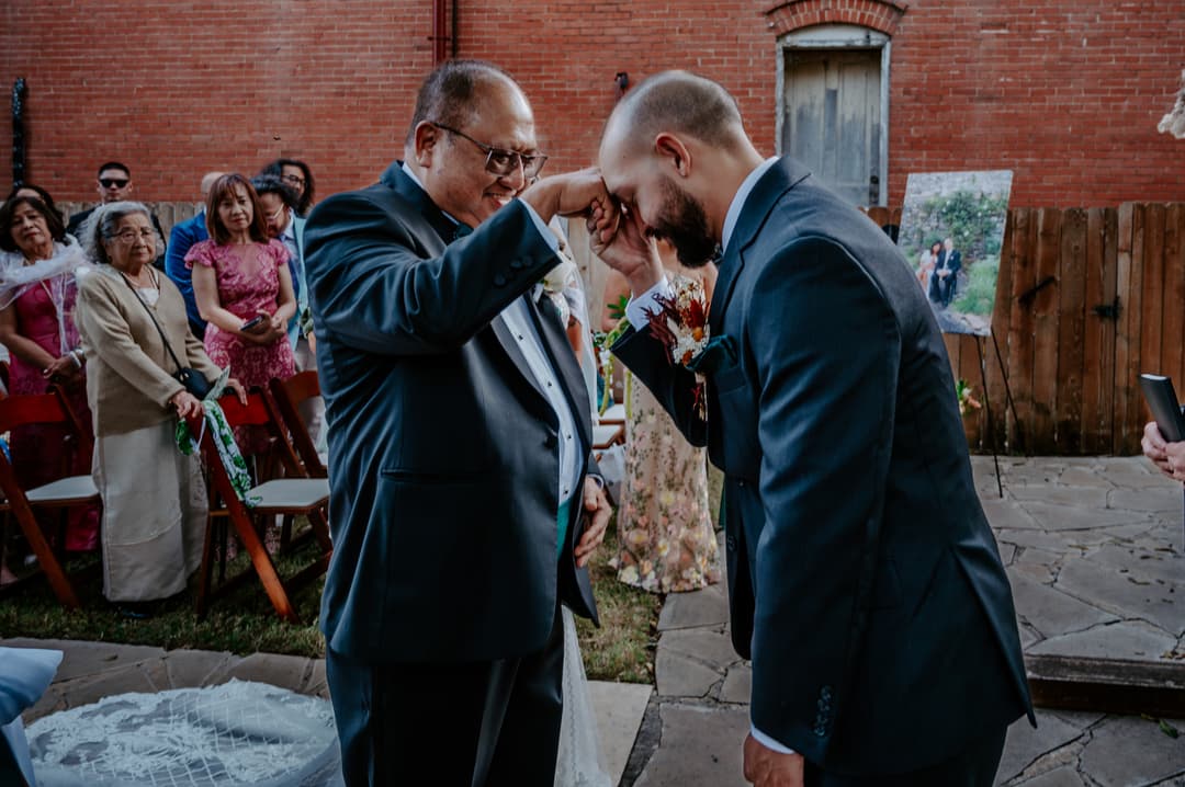 Groom blessing Grandfather with traditional Filipino blessing