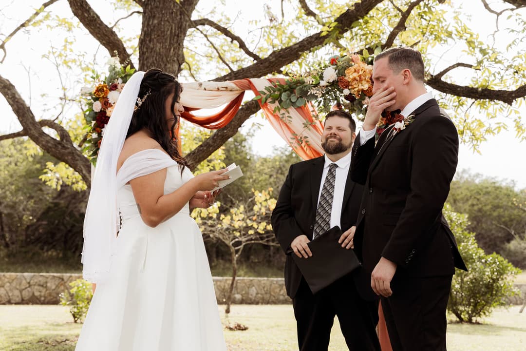 Bride & Groom reading vows