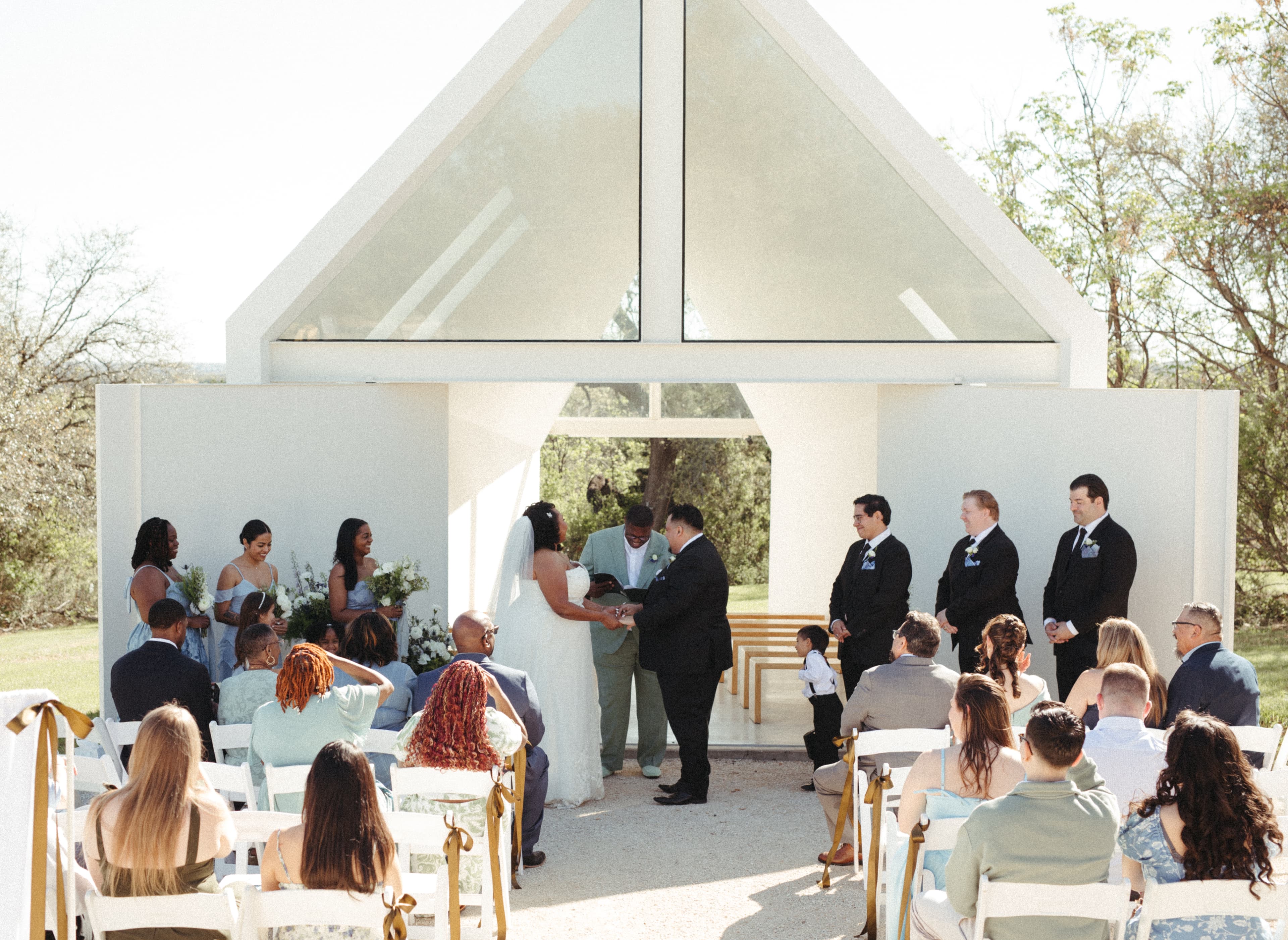 Tashira & Jozh’s wedding ceremony at Lincoln Chapel in Georgetown, Texas, filled with natural light and surrounded by loved ones.